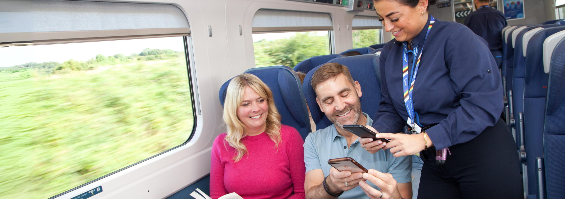 lumo staff scanning train e-ticket