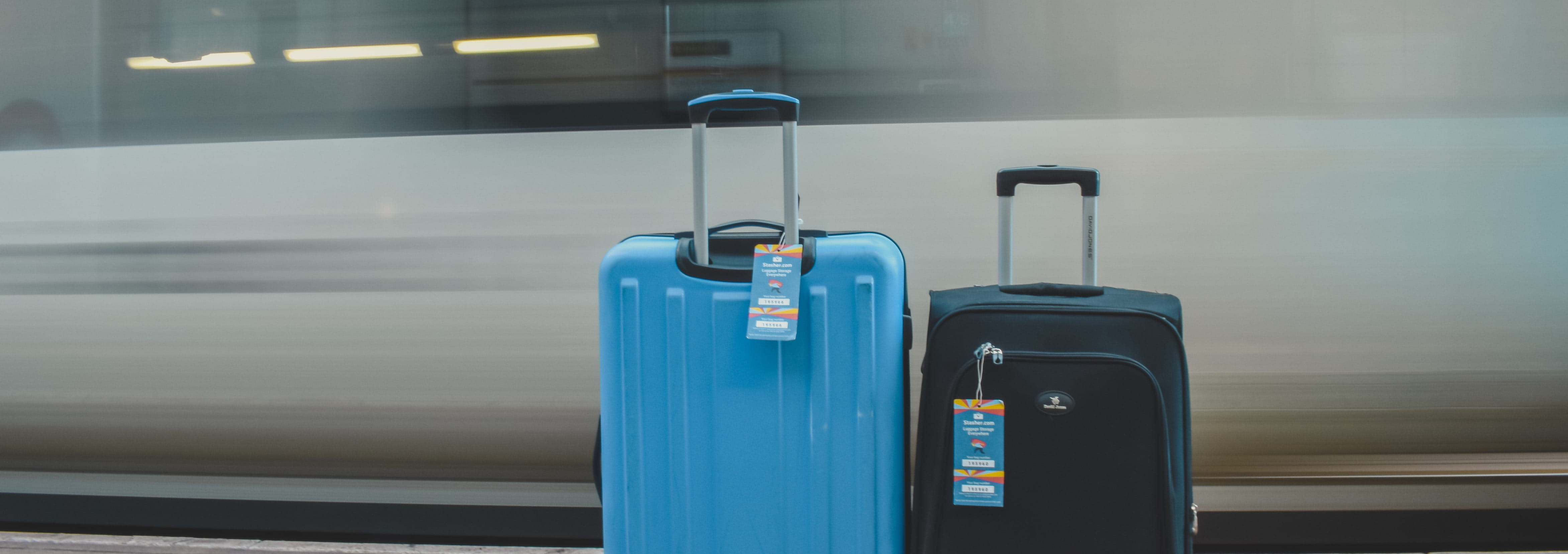 suitcases in train station