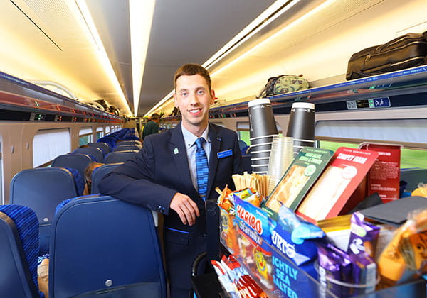 Lumo staff with catering trolley