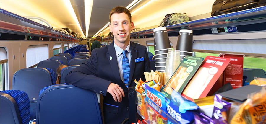 Lumo staff with catering trolley
