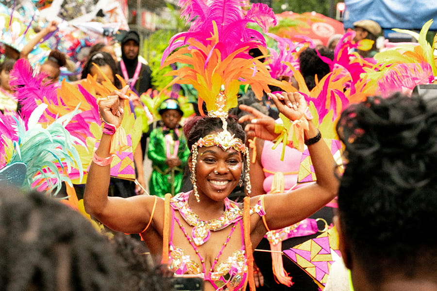 Group of people in costumes celebrating Carnival