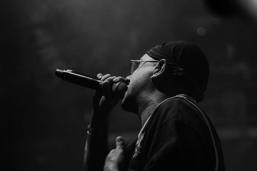 Man performing in front of a microphone