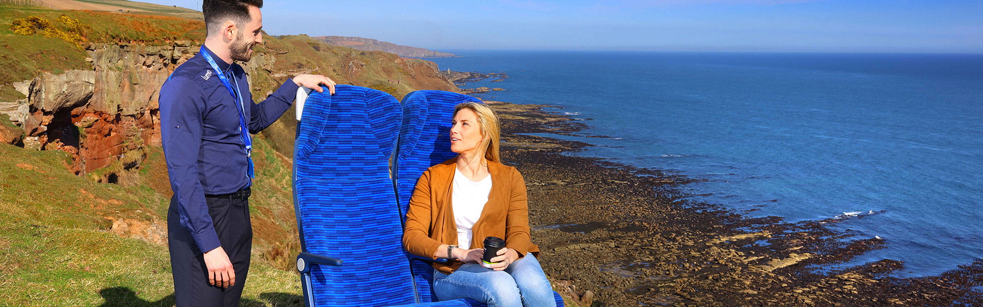 Lumo ambassador next to a customer sitting in new seats