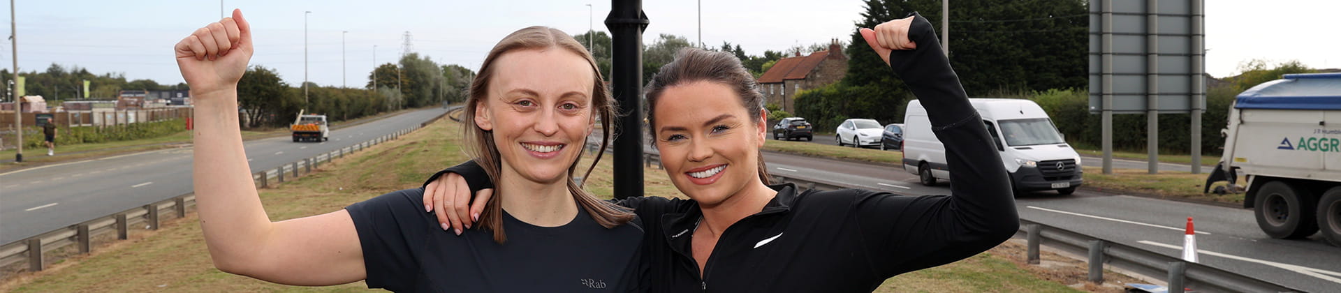 Lumo runners Beth Forbister and Lucy Harper alongside Stuart Angus from Side by Side Arts