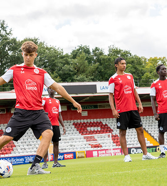Stevenage FC players playing football