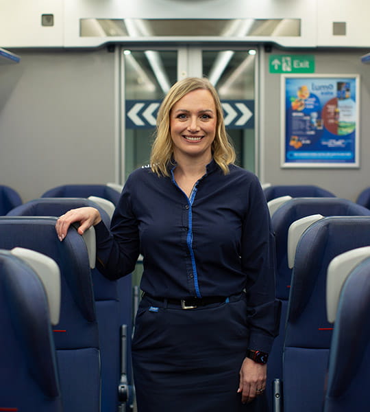 Sam Bentley, Customer Driver, inside of a Lumo train