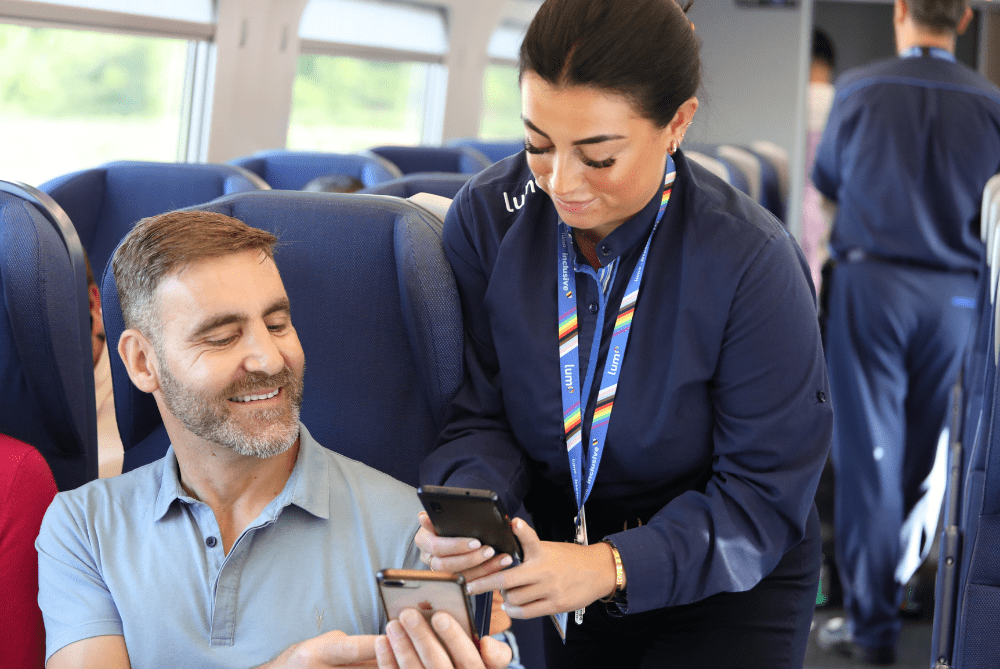 lumo staff scanning train e-ticket